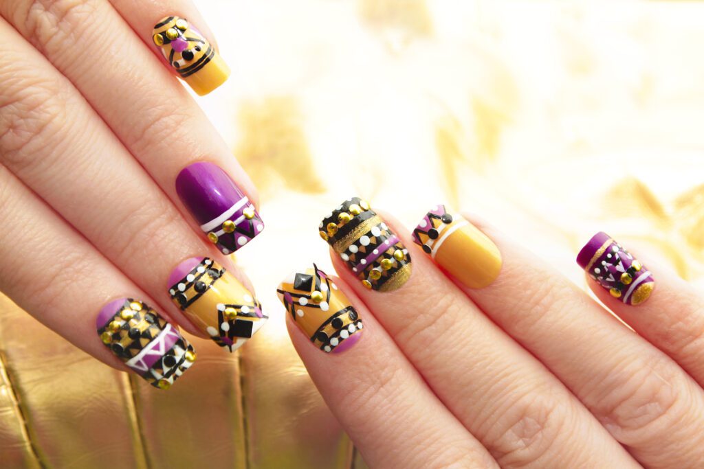 multicolored manicure with geometric pattern